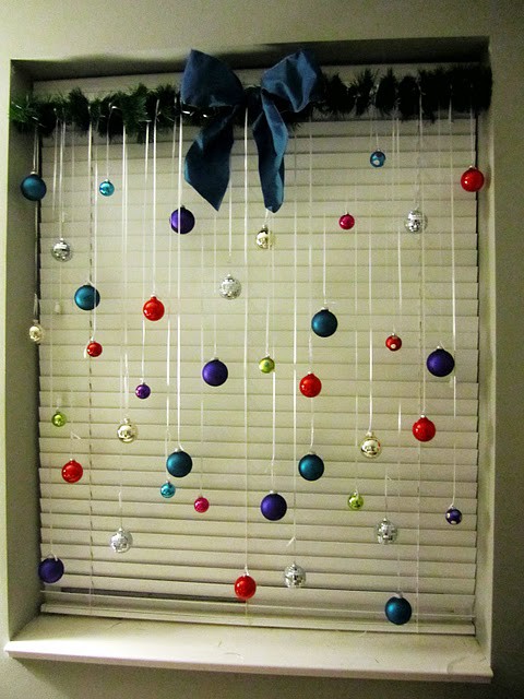 Colorful-Christmas-balls-that-are-hung-on-window