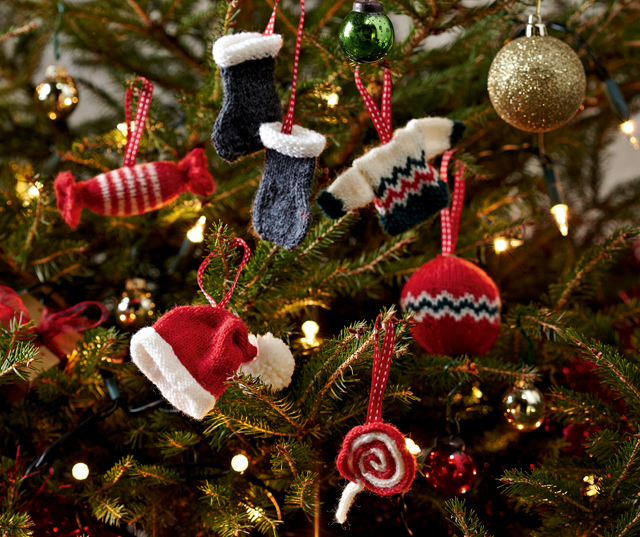 mini knitted christmas decorations on tree purple and grey