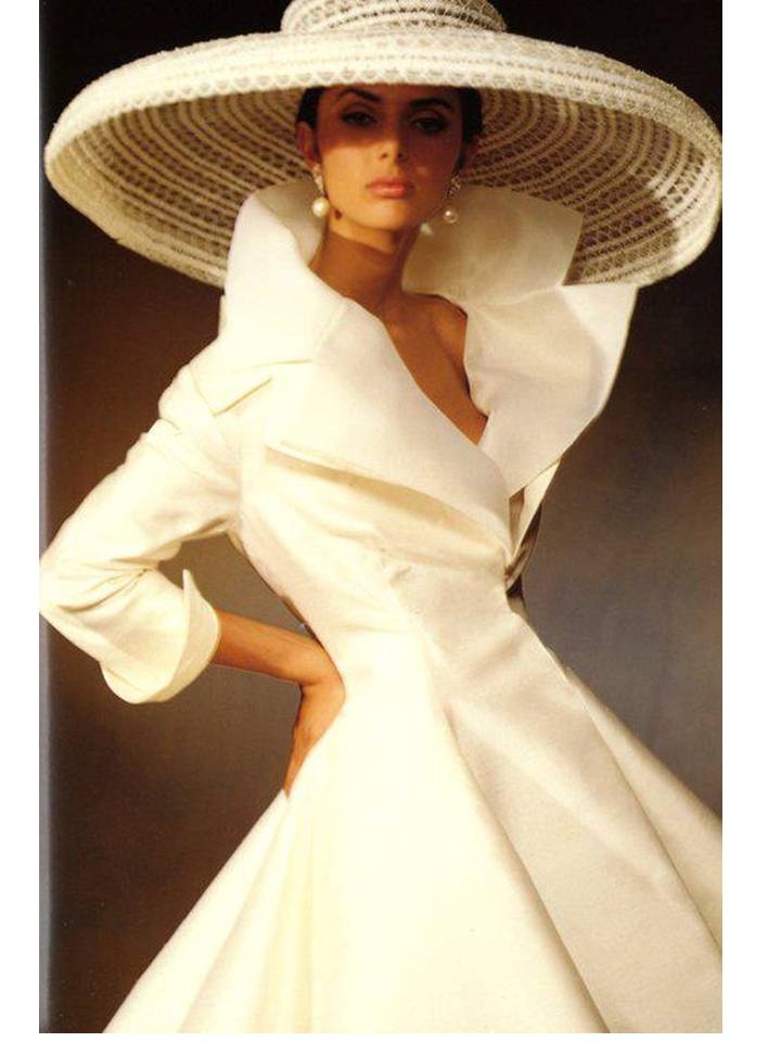 white dress with a big hat