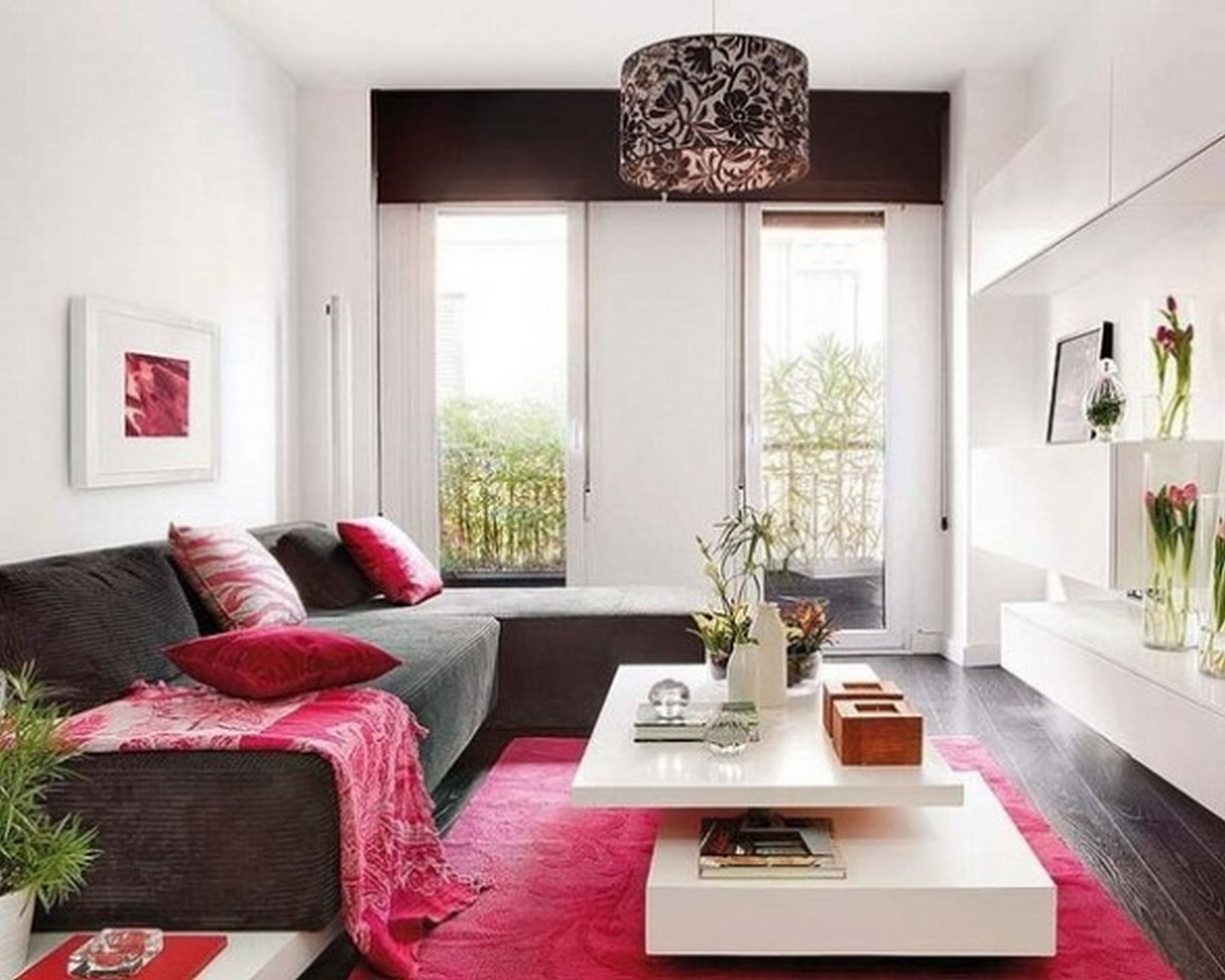 small-apartment-white-small-living-room-with-grey-sofa-and-red-rug-fur-also-white-table-and-shelves