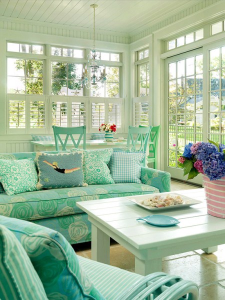 Sunroom-Ideas-With-Wooden-Table-And-Green-Sofa-And-Floral-Decoration-And-White-Wooden-Ceiling-And-Hanging-Pendant-Lamp-And-Ceramic-Tile-Design-Ideas-And-Florall-Printed-Pilow.