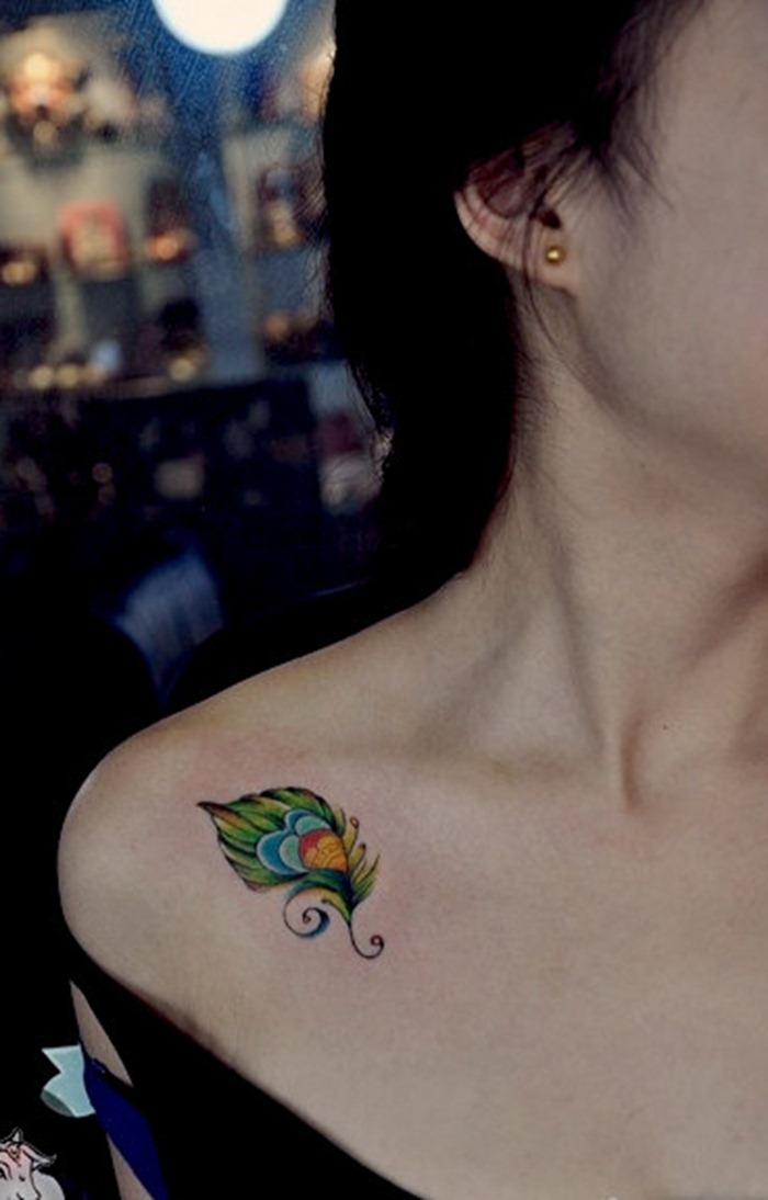 female-small-peacock-wings-tattoo-designs