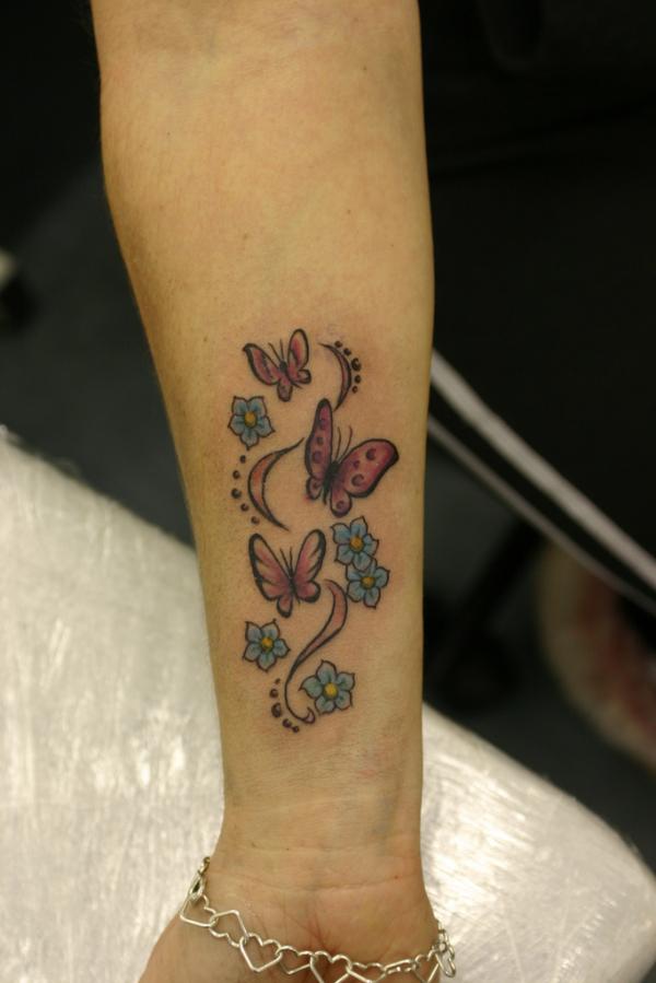 5-butterflies-and-flowers-tattoo-on-wrist