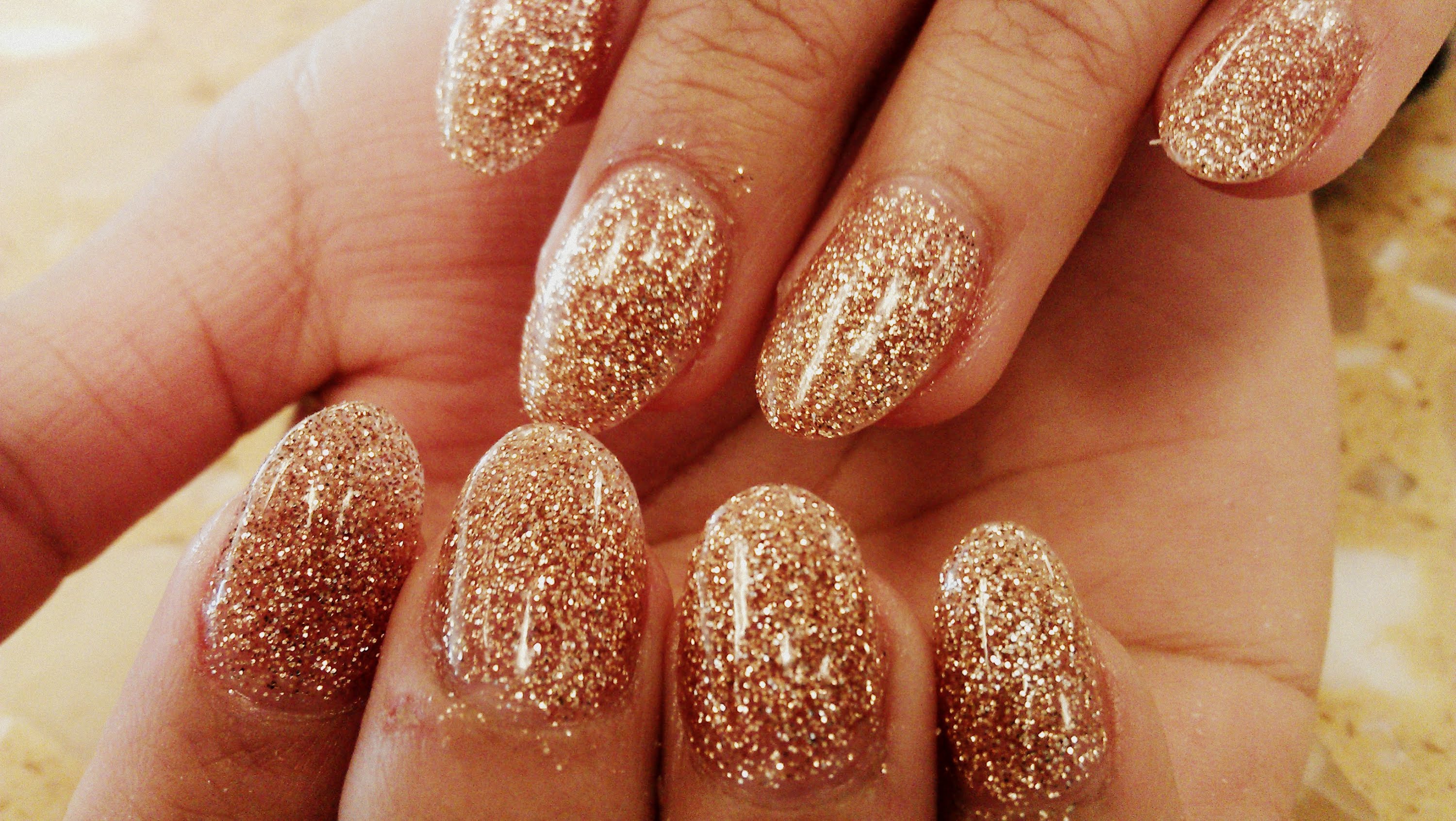 gold glitter nail art...