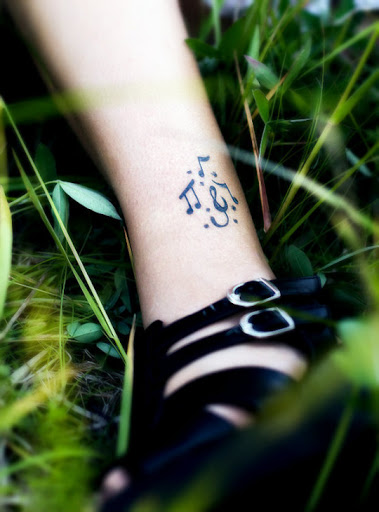 Music-notes-are-very-famous-tattoo-designs-for-men-and-women.