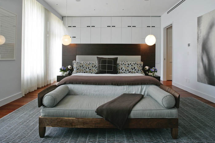 bedrooms with sofa at foot of bed