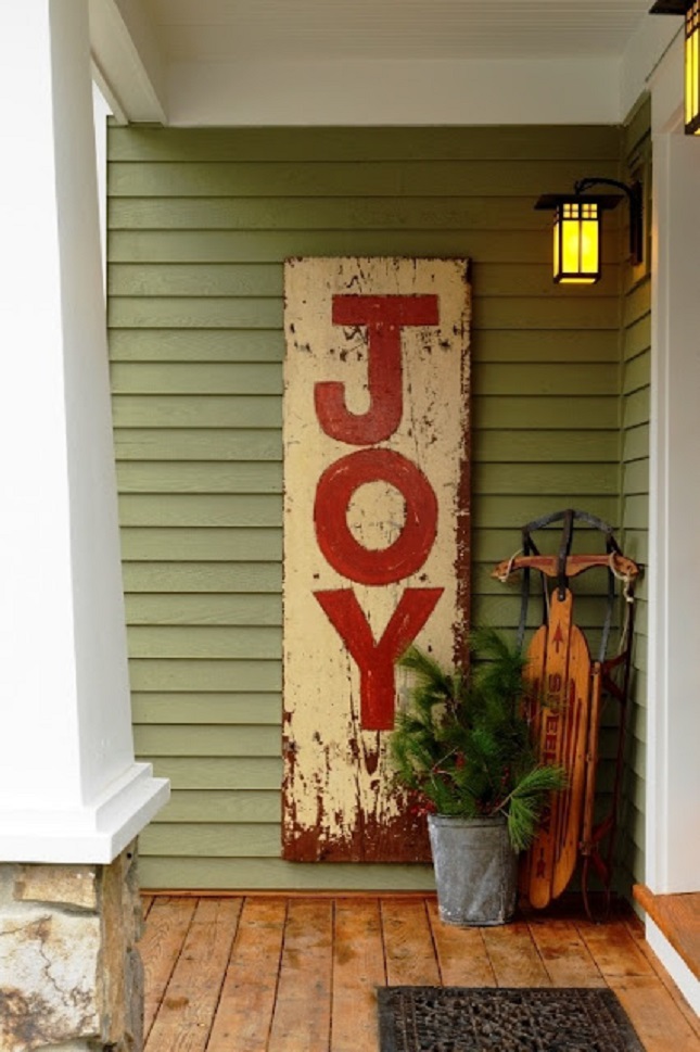joy-christmas-sign-potted-pine-tree-sleigh-front-porch-christmas-decor