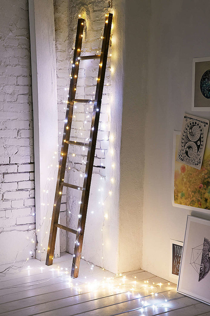 make-a-decorative-ladder-christmas-ready-by-encasing-it-in-lights