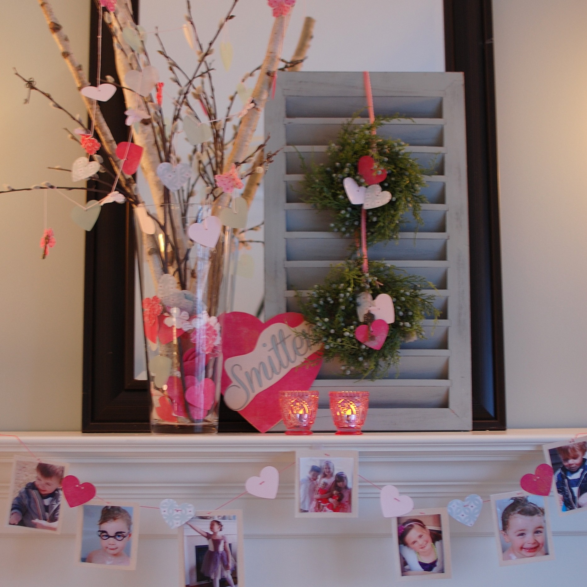 Best-Valentine-Fireplace-Mantel-Decorating-Ideas-with-Creative-Round-Pine-Arrangement-also-Cute-Family-Photos-Frame-Hanger-Ideas-for-Lovely-Valentine-White-Fireplace-Mantel-Decorating-IDEAS