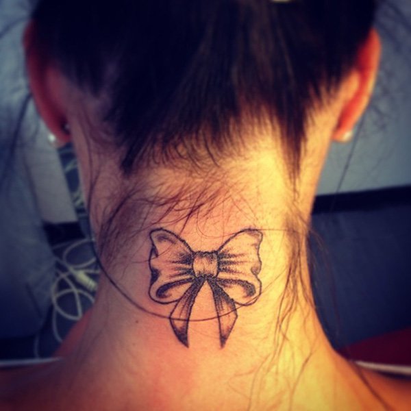 Small-ribbon-tattoo-on-neck.