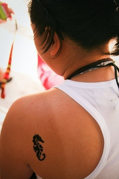 Small-sea-horse-tribal-tattoo-on-shoulder-design-only-using-black-ink-is-the-original-character-of-tribal-tattoos