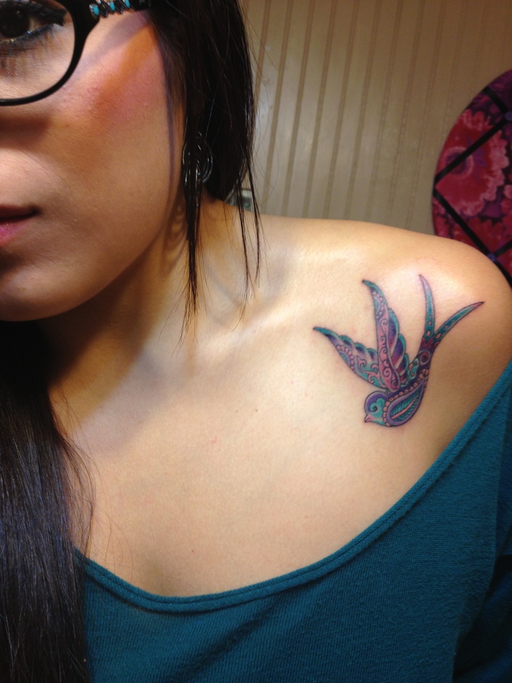 Teal-and-purple-also-go-very-well-together-we-just-love-this-bird-tattoo.