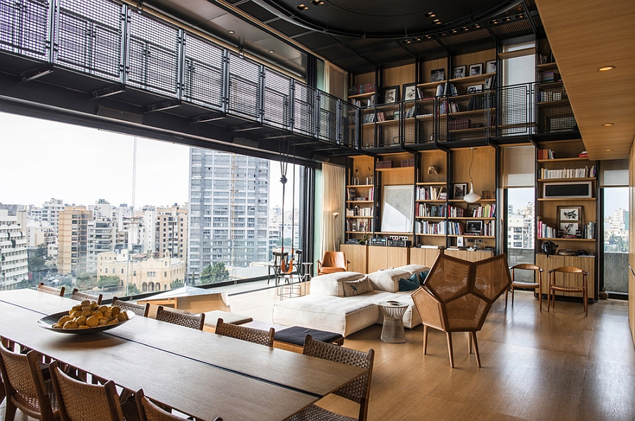 Plush-decor-and-wooden-walls-bring-warmth-to-the-steely-penthouse.