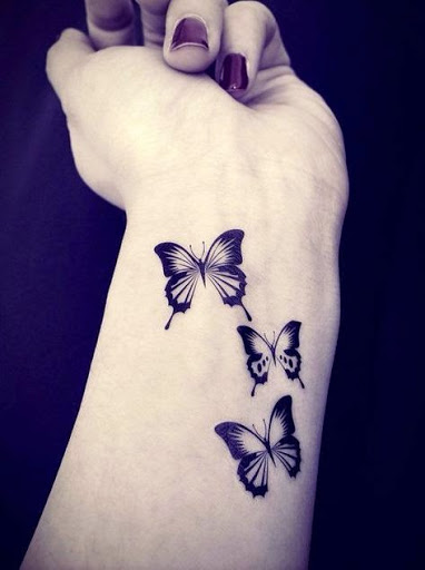 butterfly wrist tattoos.