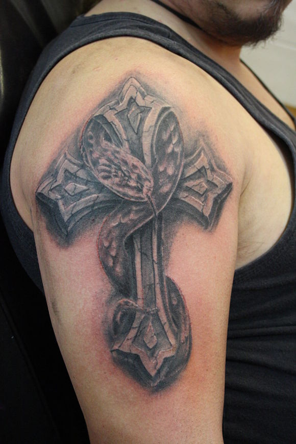 grey-ink-cross-and-snake-turbo-tattoo-on-shoulder_