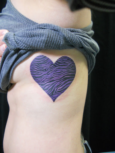 Heart-Tattoo-designs-on-rib-cage-ideas-for-girls.