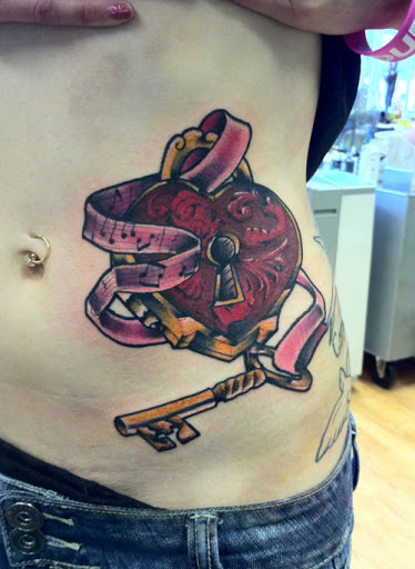 Heart-and-key-tattoos-ideas-for-women-on-rib.