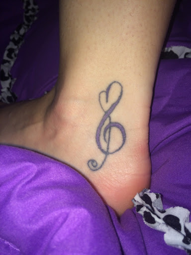 Music-note-with-heart-tattoo-designs.