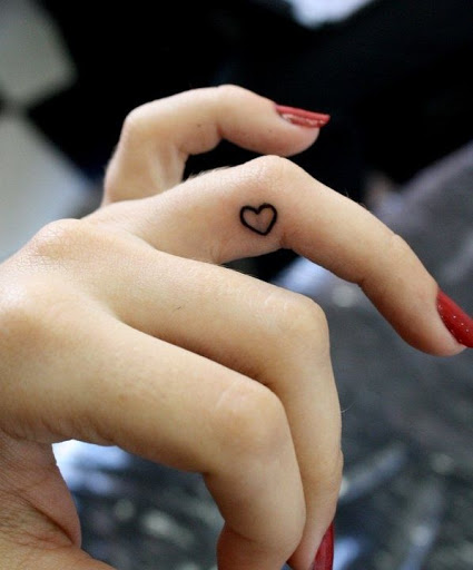 Small-cute-heart-tattoos-designs-on-the-ring-finger.j