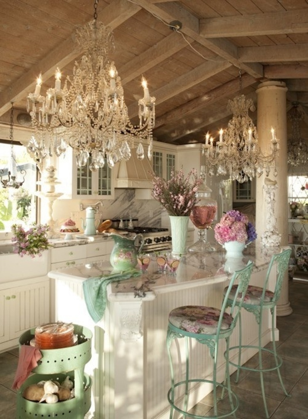 shabby-chic-kitchen-ideas-with-double-kitchen-chandelier-above-kitchen-island-with-seating-for-two-and-white-cabinets.