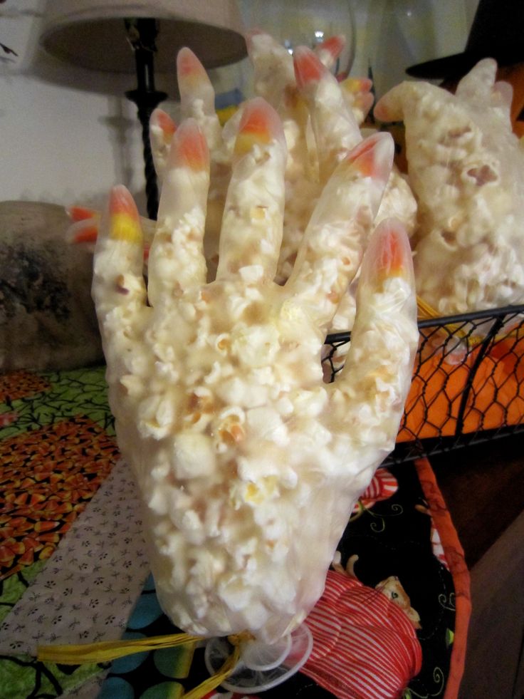 Halloween-Party-Ideas-for-Kids-and-Teens-Popcorn-Candy-Corn-hand