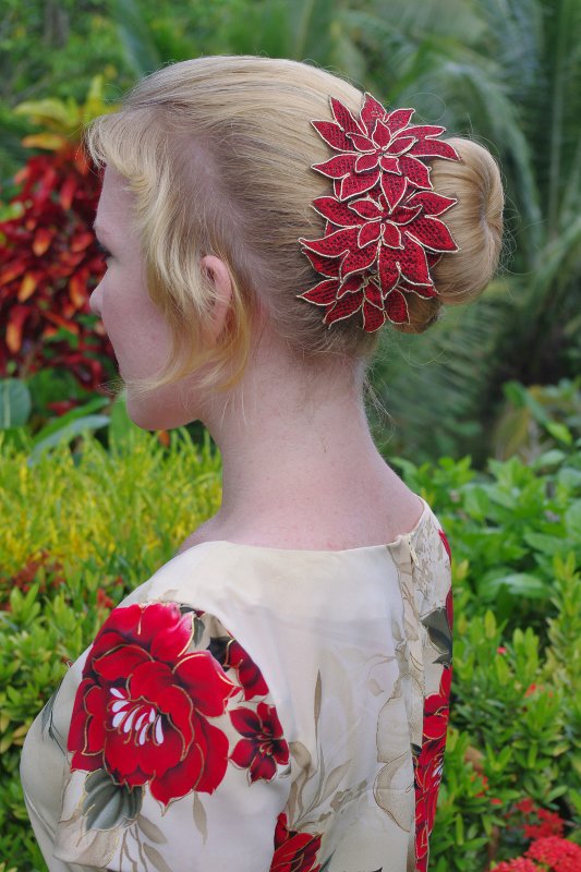 simple-low-bun-with-red-hair-accessory