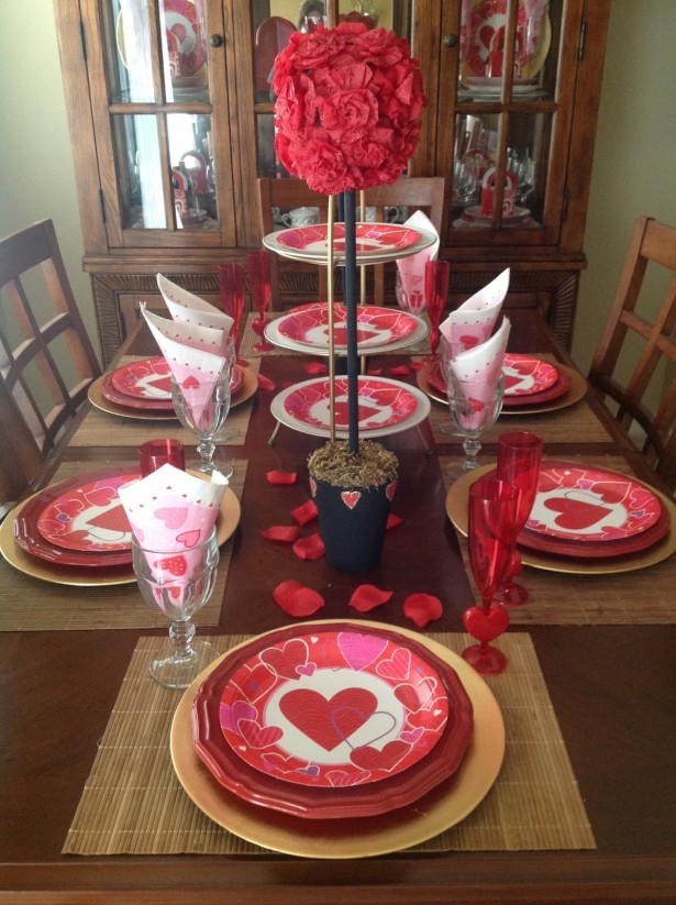 marvelous-red-paper-flower_round-pink-heart-pattern-plate_red-wine-glass_red-rose-petals_wooden-laminate-floor_simple-dining-room_valentines-day-decoration-ideas_flower-topiary