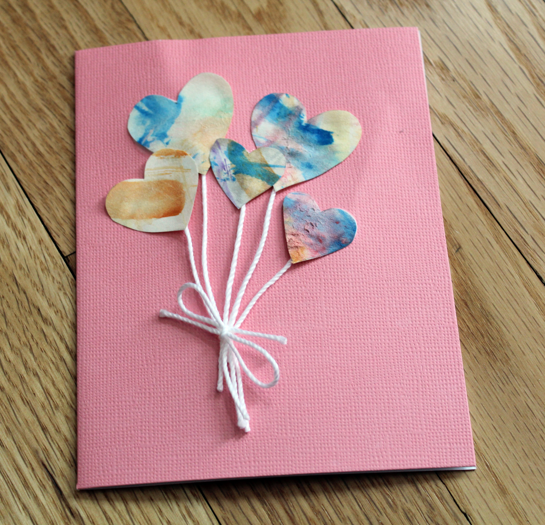 valentines07 - Trace hearts onto your child's artwork, then cut them out and paste them onto Valentine's Day cards.